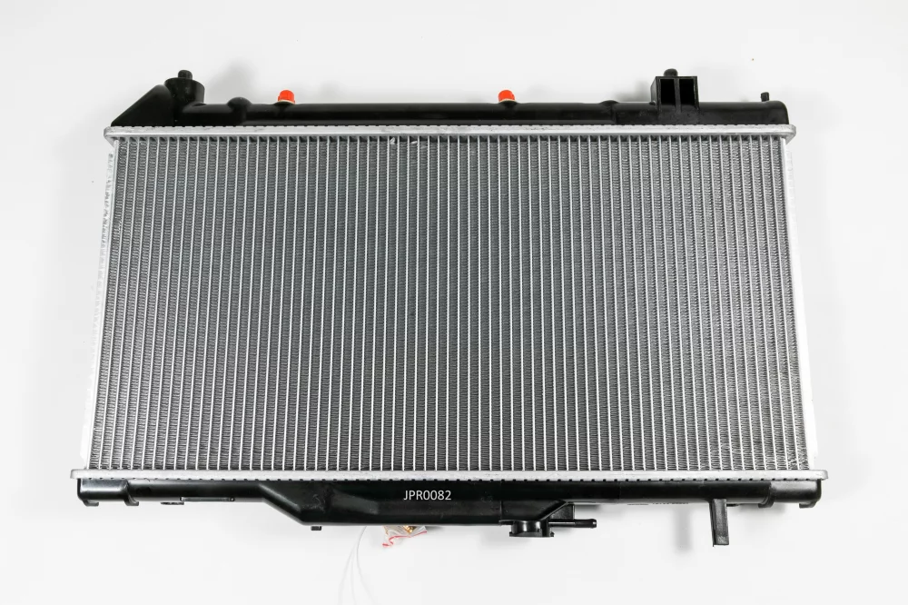 Радиатор двигателя AT (Способ сборки сот - Паяный) - Артикул JPR0082 - Производитель Just Drive - Фото, Отзывы, Цены 