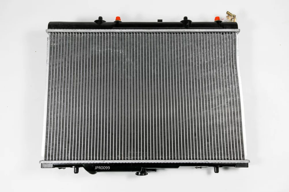 Радиатор двигателя AT (Способ сборки сот - Паяный) - Артикул JPR0099 - Производитель Just Drive - Фото, Отзывы, Цены 